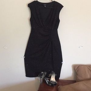Black cocktail dress with clear shoes..